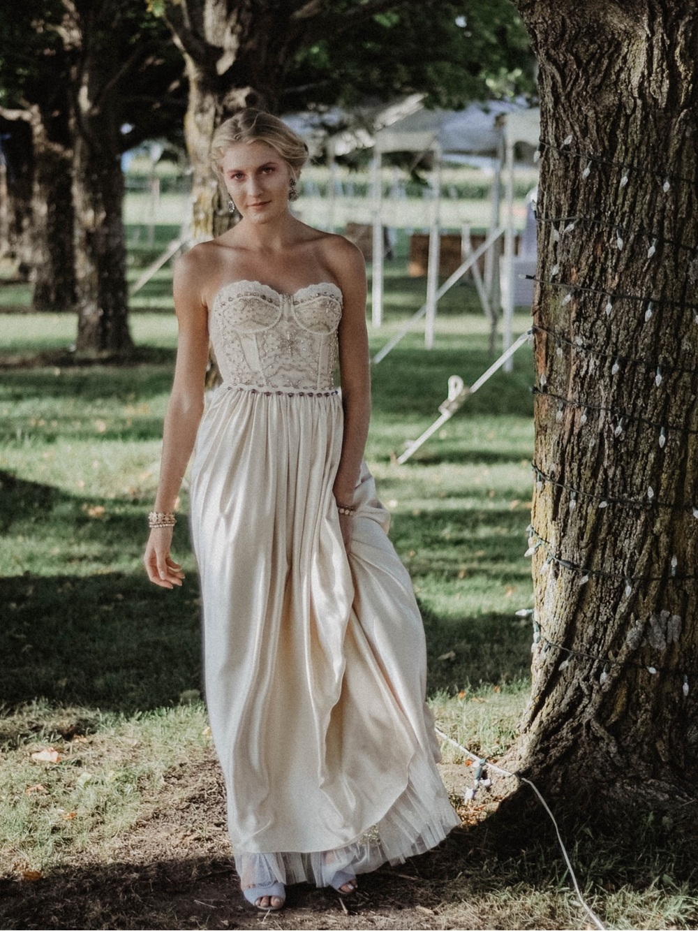 Elegant Strapless Beaded Bustier Satin Gown in Champagne